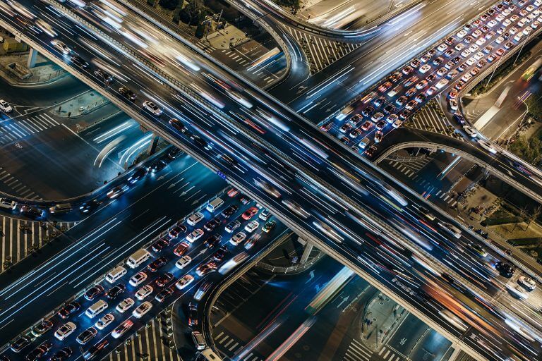 Highway junction aerial view at night time