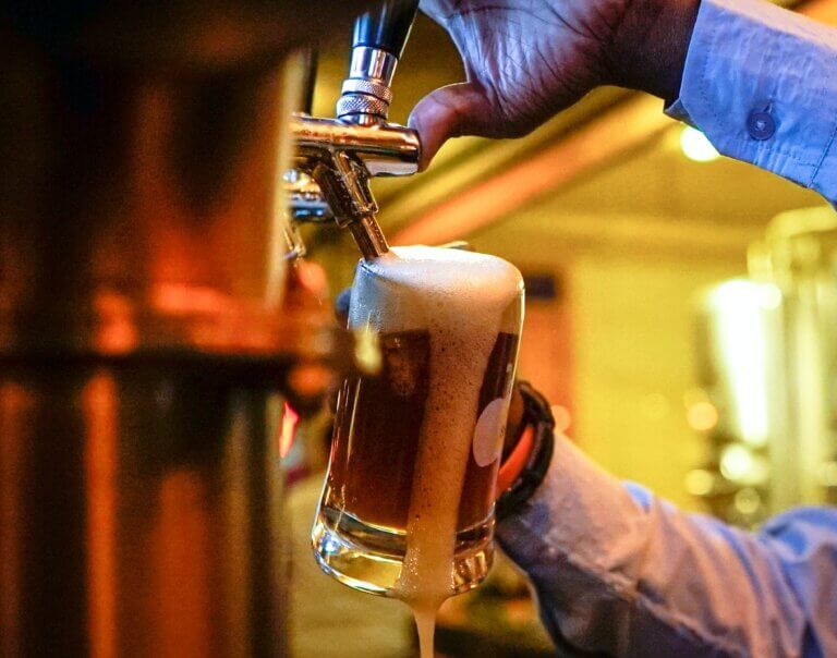 Beer being poured from tap