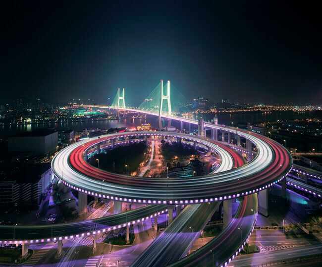 Asia, China, Shanghai, Nanpu bridge illuminated at night, elevated view.